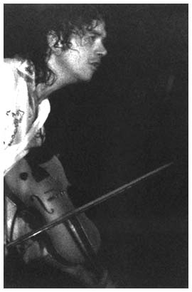 Slades Jim Lea on the fiddle at the Odeon Birmingham 1982. Photo courtesy of Dave Kemp
 